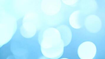 Abstract light blue blurred background with bokeh effect. video