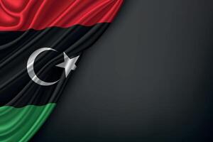 Waving Libya Flag on Dark Background vector