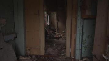 A haunting glimpse into the decaying and neglected interior of an abandoned home, revealing its deep neglect and decay video