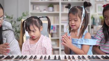 A group children of students doing activities singing and dancing in the classroom video