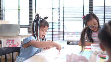 Portrait of children doing learning activities in the classroom video