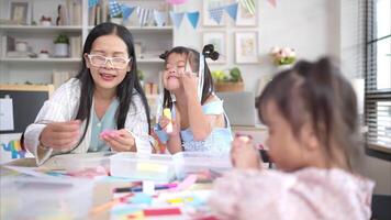 Portrait of children doing learning activities in the classroom video