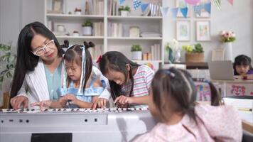 A group children of students doing activities singing and dancing in the classroom video
