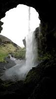 Seljalandsfoss Waterfall Viewed from Behind in Iceland video
