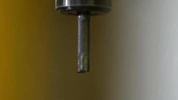 Close Up of Metal Drill Bit with Spiral Design and Gradient Background video