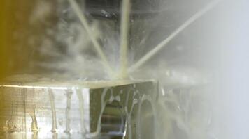 Close Up of CNC Machine Metalworking with Coolant Spray video