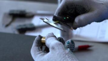 Close Up of Digital Caliper Measuring Metallic Object in Workshop video