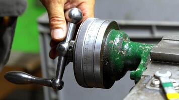 Close Up of Hand Operating Metal Lathe with Dial Indicator video