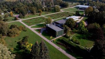Expansive Botanical Garden with Geometric Pathways and Modern Building video