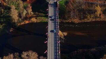 Aerial View of Bridge with Latvian Flags in Sigulda, Latvia video