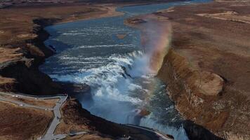 Gullfoss Waterfall with Rainbow in Iceland's Rugged Canyon video