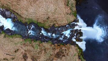 Aerial View of Winding River in Iceland's Rugged Landscape video