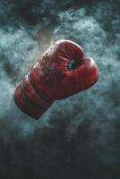 Boxing glove in motion creating a dramatic atmosphere with dust and mist photo