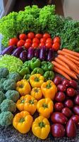 Colorful assortment of fresh vegetables arranged on a countertop for a healthy meal preparation photo