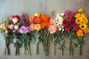 Colorful flower arrangement showcasing various blooms on a neutral backdrop photo