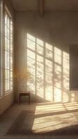Bright and airy room with shadows and a small table featuring a decorative plant photo