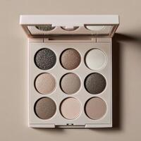 Elegant eyeshadow palette showcasing neutral and sparkly shades for versatile makeup looks photo