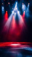 Bright stage lights illuminating colorful smoke during a live music performance at night photo
