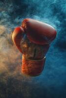 Boxing glove in motion creating a dramatic atmosphere with dust and mist photo