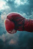 Boxing glove in motion creating a dramatic atmosphere with dust and mist photo
