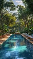 Serene green oasis featuring a tranquil swimming pool surrounded by lush nature photo