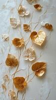 Golden leaves and delicate flowers create an elegant wall decoration in a modern space photo