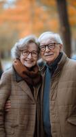 Elderly couple enjoying a sunny day at the park surrounded by nature and vibrant flowers photo