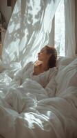 Cozy moments in a sunlit room with a relaxed woman wrapped in a soft blanket photo