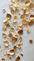 Golden leaves and delicate flowers create an elegant wall decoration in a modern space photo