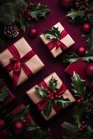 Gifts wrapped in brown paper with red ribbons and holiday decorations on dark background photo