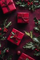 Gifts wrapped in brown paper with red ribbons and holiday decorations on dark background photo