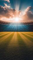 Sunrise illuminating a sports field with shadows and seating in the early morning hours photo