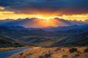Sunrise over the mountain peaks with misty valleys in a serene landscape photo