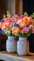Colorful fresh flower arrangements in jars displayed at a floral shop photo