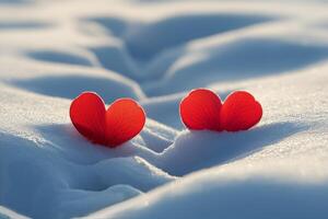 Red glass hearts resting on snow create a romantic winter atmosphere in the outdoors photo
