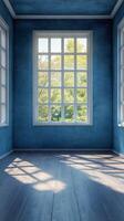 Bright blue room with large window casting shadows in afternoon light photo