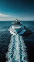 Cruise ship navigating through calm ocean waters in broad daylight photo