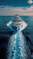 Cruise ship navigating through calm ocean waters in broad daylight photo