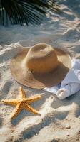 Relaxing beach essentials on warm sand with gentle waves at a tropical location photo