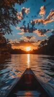 Sunset cruise on a serene river with golden reflections and colorful sky photo
