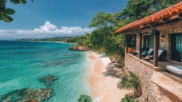 Breathtaking tropical beach with clear turquoise water and seaside villa in the Caribbean photo