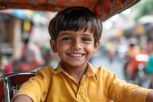 Joyful boy smiles while riding in rickshaw through bustling market street in vibrant city photo