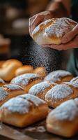 Baker dusts fresh bread rolls with flour in a rustic kitchen setting photo