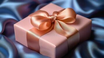 Attractive gift box with a shiny bow surrounded by colorful lights photo
