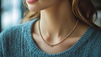 Elegant young woman wearing a necklace in a cozy indoor setting with soft lighting photo