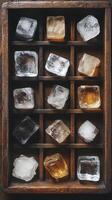 Unique arrangement of transparent and colored ice cubes in a wooden tray photo