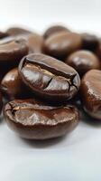 Coffee beans piled on wooden surface in a cozy kitchen setting during daylight hours photo