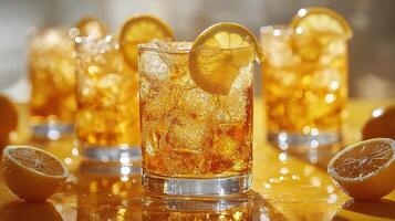 Refreshing iced tea with lemon slices served on a sunny day photo
