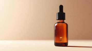 Dark amber dropper bottle with dropper on beige background showcasing minimalistic design photo