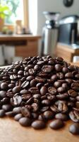 Coffee beans piled on wooden surface in a cozy kitchen setting during daylight hours photo